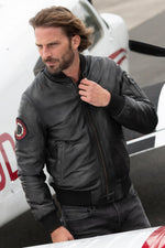 Black leather bomber jacket with sleeve patch - Image n°4