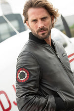 Black leather bomber jacket with sleeve patch - Image n°5