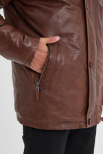 A bison-brown sheepskin jacket, mid-length with adjustable collar. - Image n°7