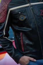 Le Mans-inspired black sheep leather jacket with vintage badges. - Image n°14