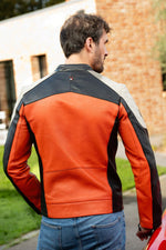 Rider's orange sheepskin jacket. Le Mans heritage, bold biker style. - Image n°3