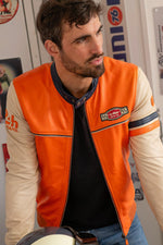 Orange sheepskin racer jacket with Le Mans patches and ribbed waist. - Image n°1