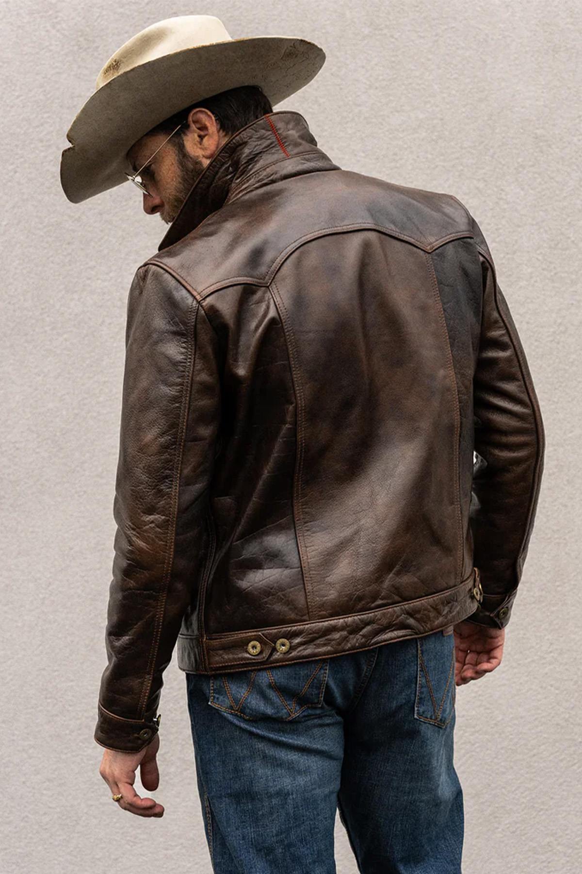 Rustic mahogany buffalo leather trucker jacket with western stitching. - Image n°10