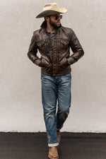 Rustic mahogany buffalo leather trucker jacket with western stitching. - Image n°12
