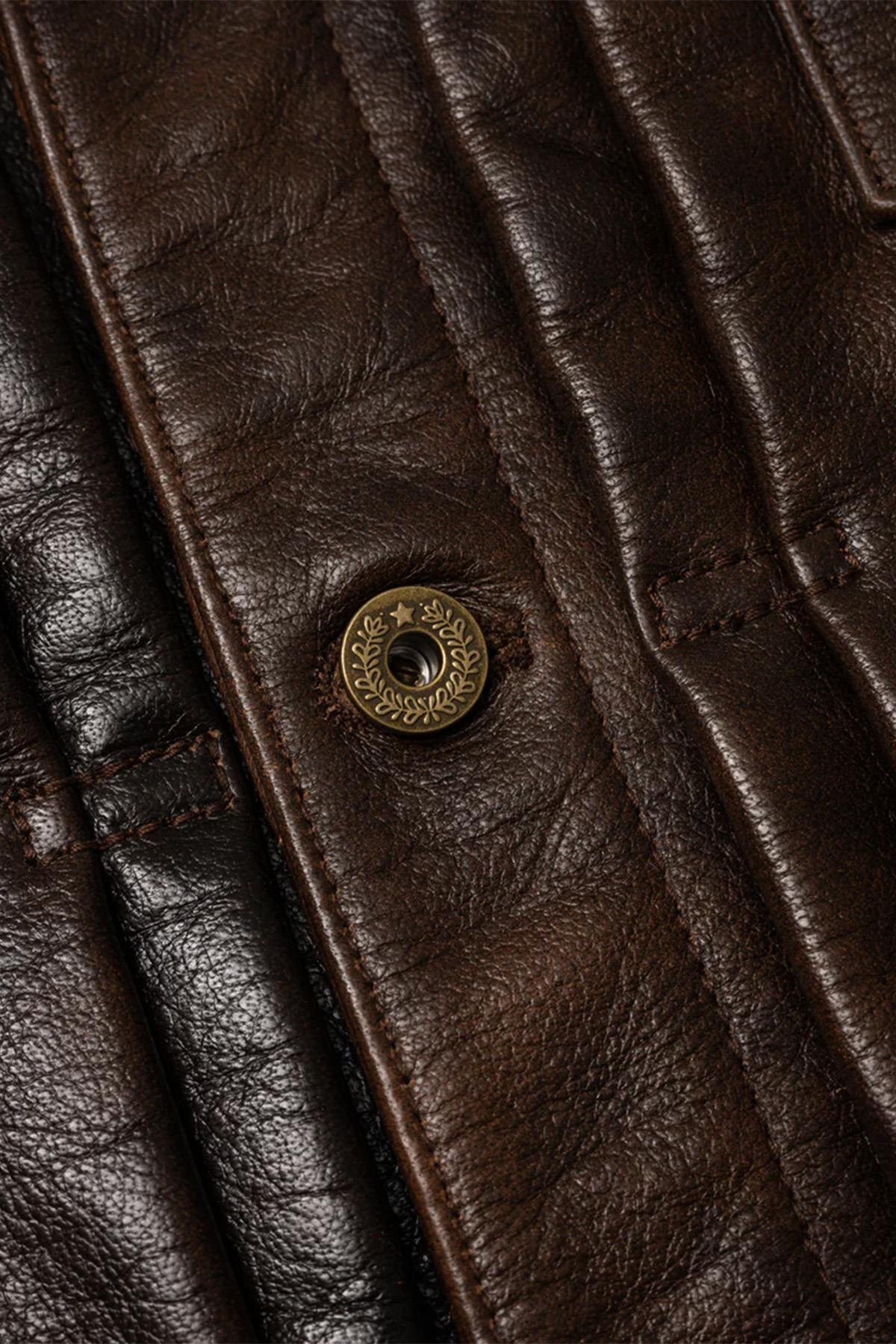 Rustic mahogany buffalo leather trucker jacket with western stitching. - Image n°6