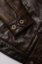 Rustic mahogany buffalo leather trucker jacket with western stitching. - Image n°16