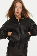 Black lambskin bomber with ribbed trims and a green lining. - Image n°1