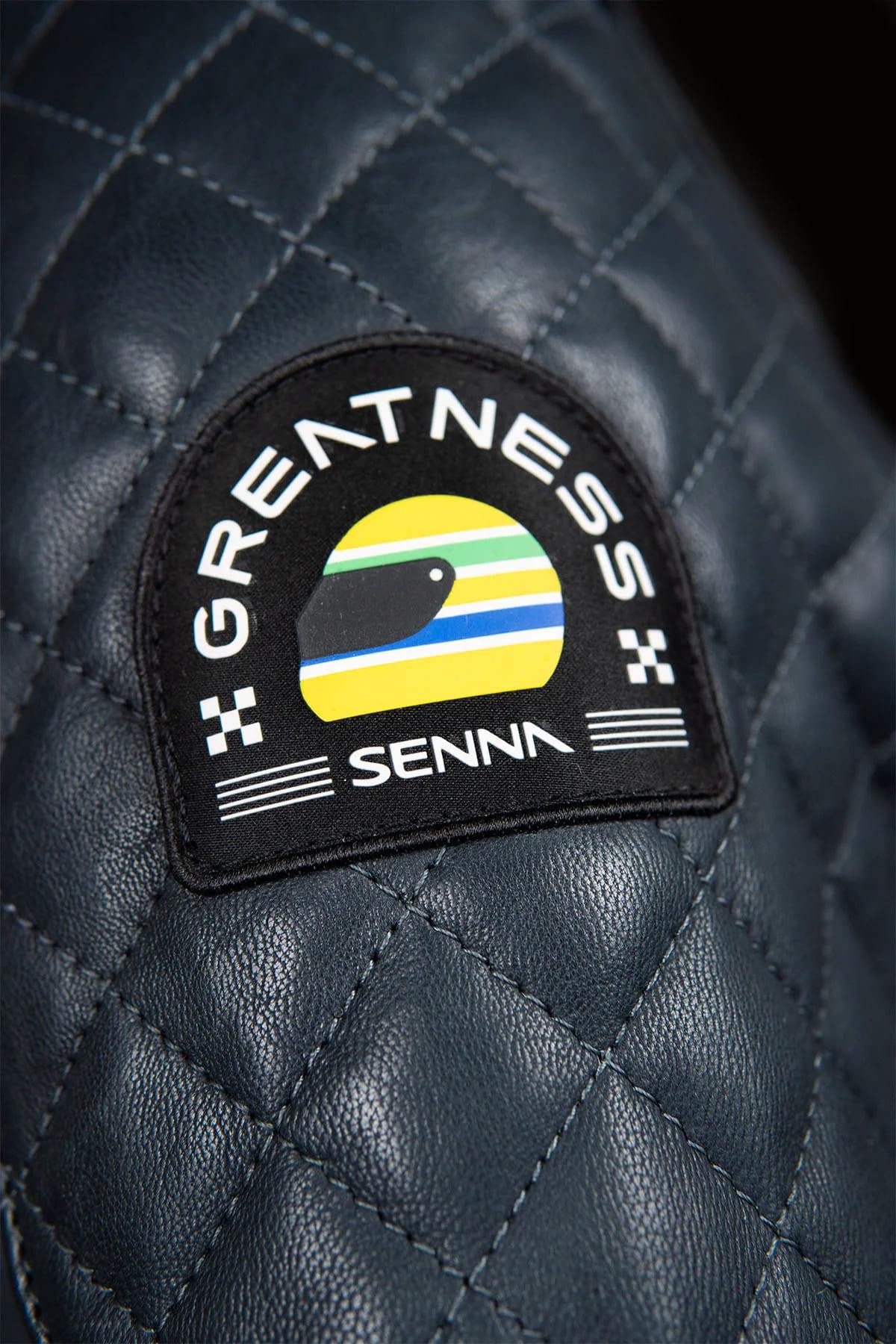 Navy sheepskin jacket with Senna's Lotus F1 patches and JPS lining. - Image n°7