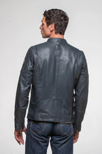 Navy sheepskin jacket with Senna's Lotus F1 patches and JPS lining. - Image n°4