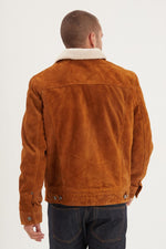 Heavy split cowhide in cognac. Sherpa-lined, slim fit, rugged warmth. - Image n°3