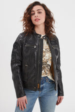 Soft black sheep leather jacket with a relaxed fit and moto collar. - Image n°1