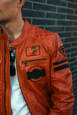 Orange racing leather jacket with vintage patches - Image n°5