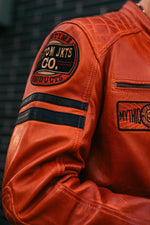 Orange racing leather jacket with vintage patches - Image n°14