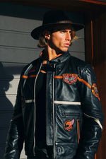 Redskins' sheepskin biker jacket with teddy collar and bold badges. - Image n°1