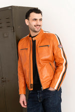 Burnt orange lambskin jacket, vegetable-tanned for a racing edge. - Image n°1