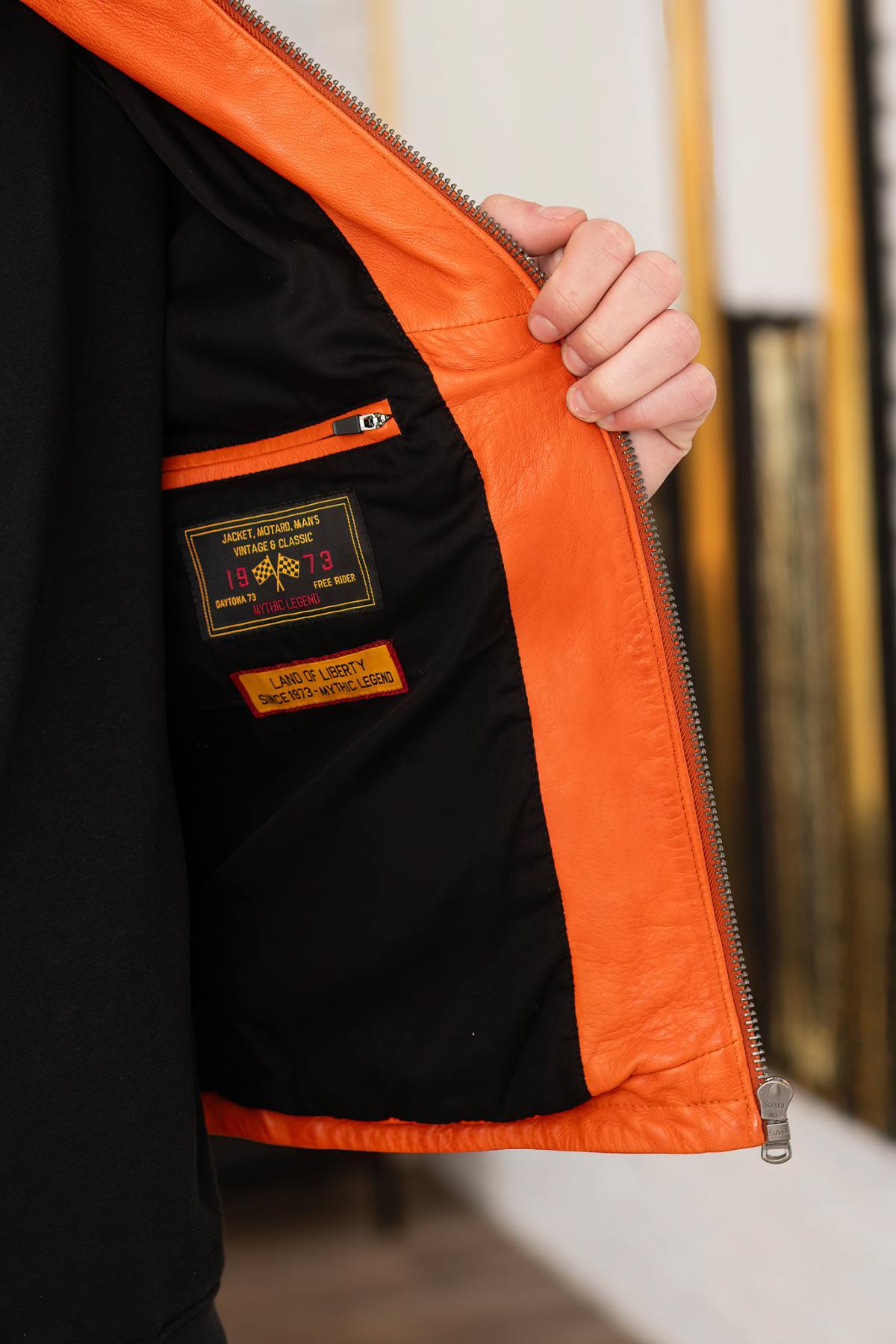 Orange lambskin jacket with biker collar and zipped sleeves. - Image n°8