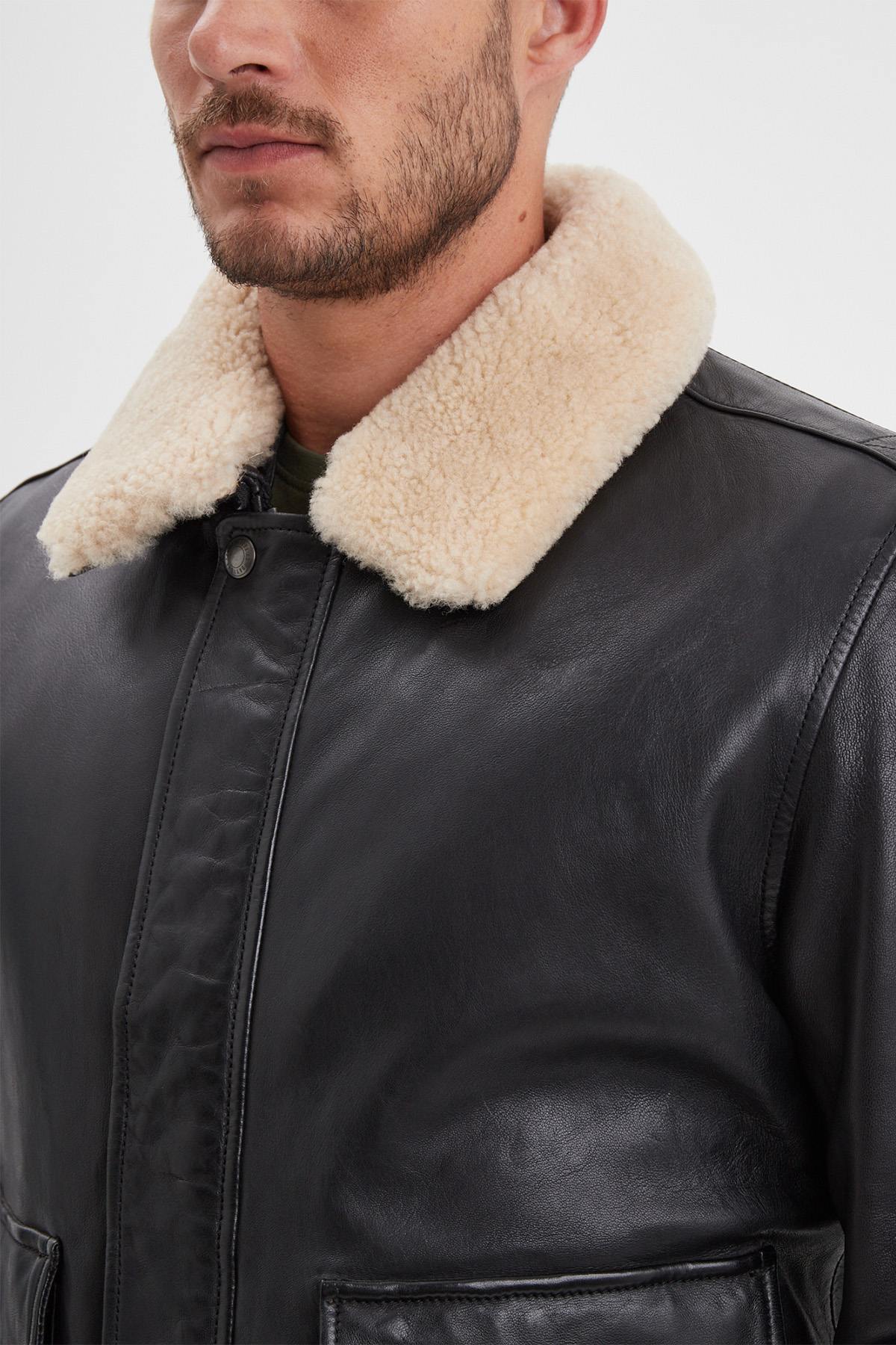 Slim aviator in petrol-black lambskin with removable shearling collar. - Image n°3