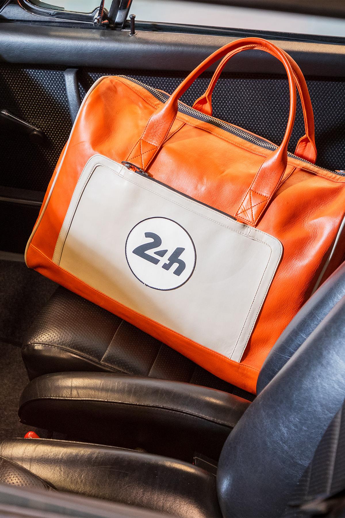 24H Le Mans orange and ecru leather travel bag - Image n°1