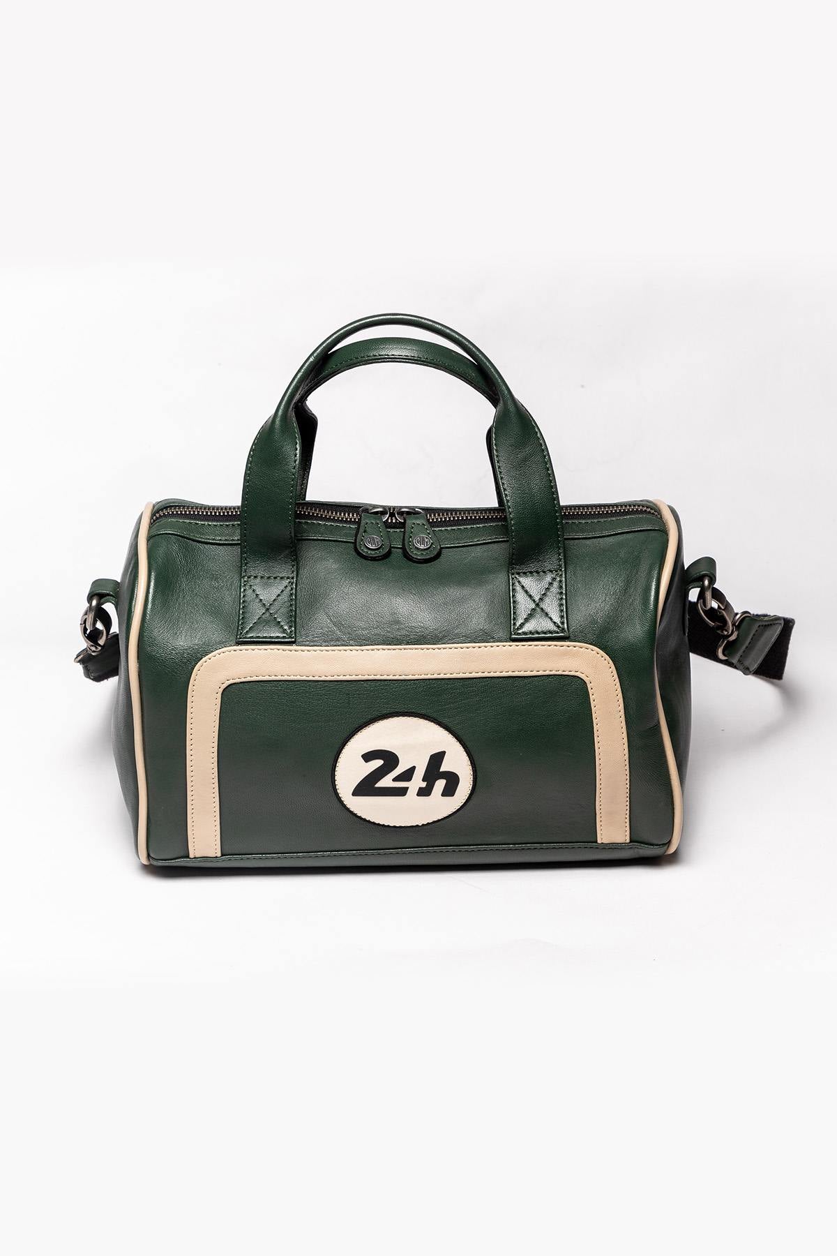 Racing green leather handbag with ecru inserts - Image n°1