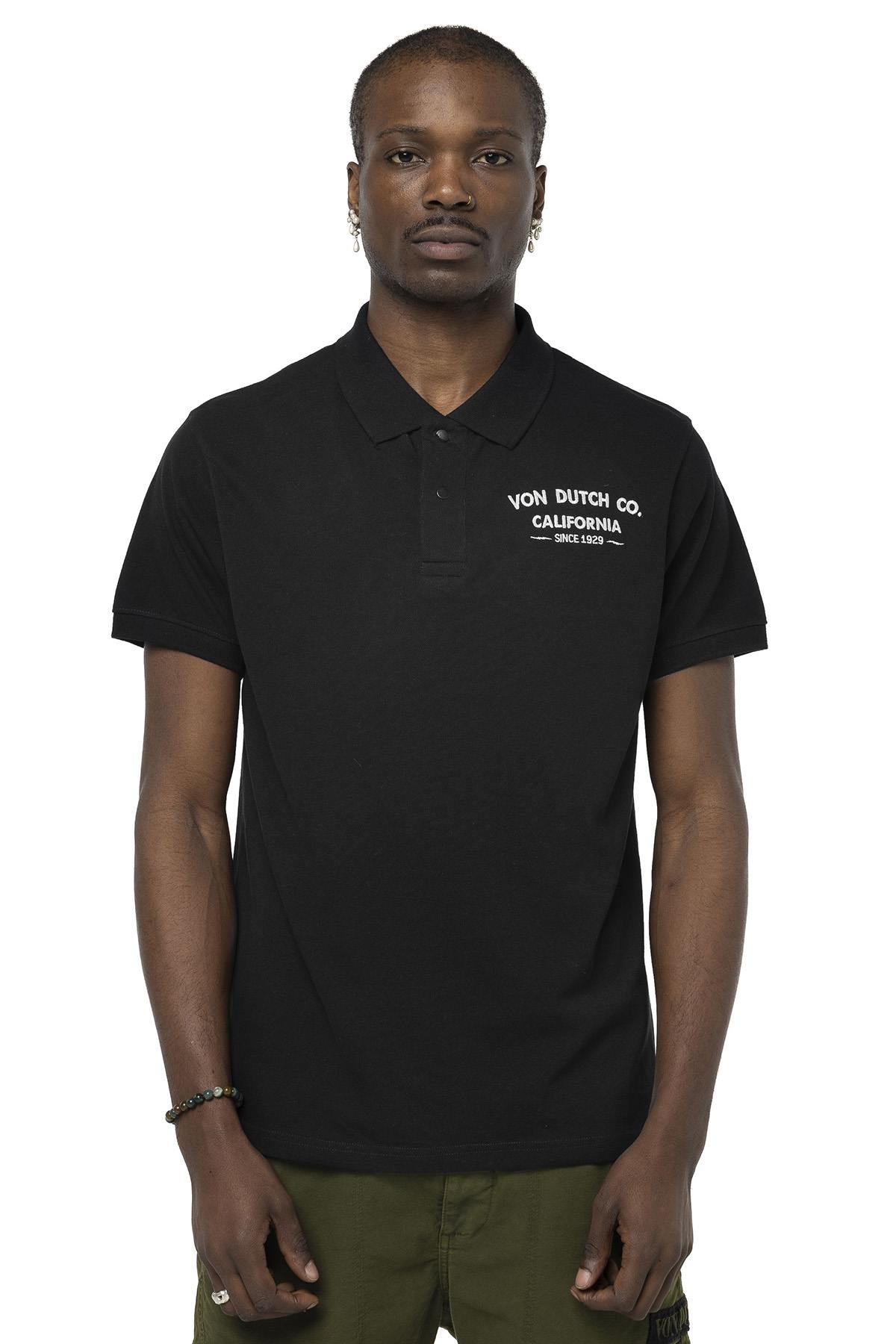 Black cotton polo shirt with embroidered heart and back - Image n°1