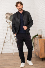 Perforated lambskin jacket in navy, stand-up collar, snap pockets. - Image n°4