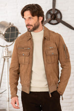Suede leather bomber jacket with metal emblem - Image n°1