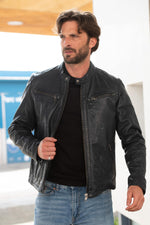 Navy blue lambskin jacket with a biker collar and regular fit. - Image n°1