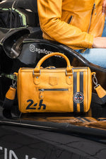 Women's racing yellow leather handbag - Image n°1