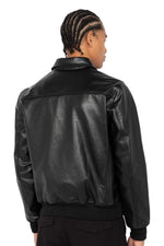 Black leather jacket with shirt collar and ribbed edges - Image n°2