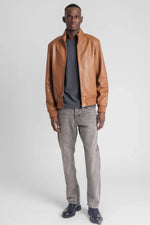 Sleek cognac-colored leather jacket with high collar - Image n°3