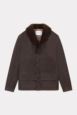 Chevignon's cacao cowhide coat with fur-trimmed shawl collar. - Image n°7