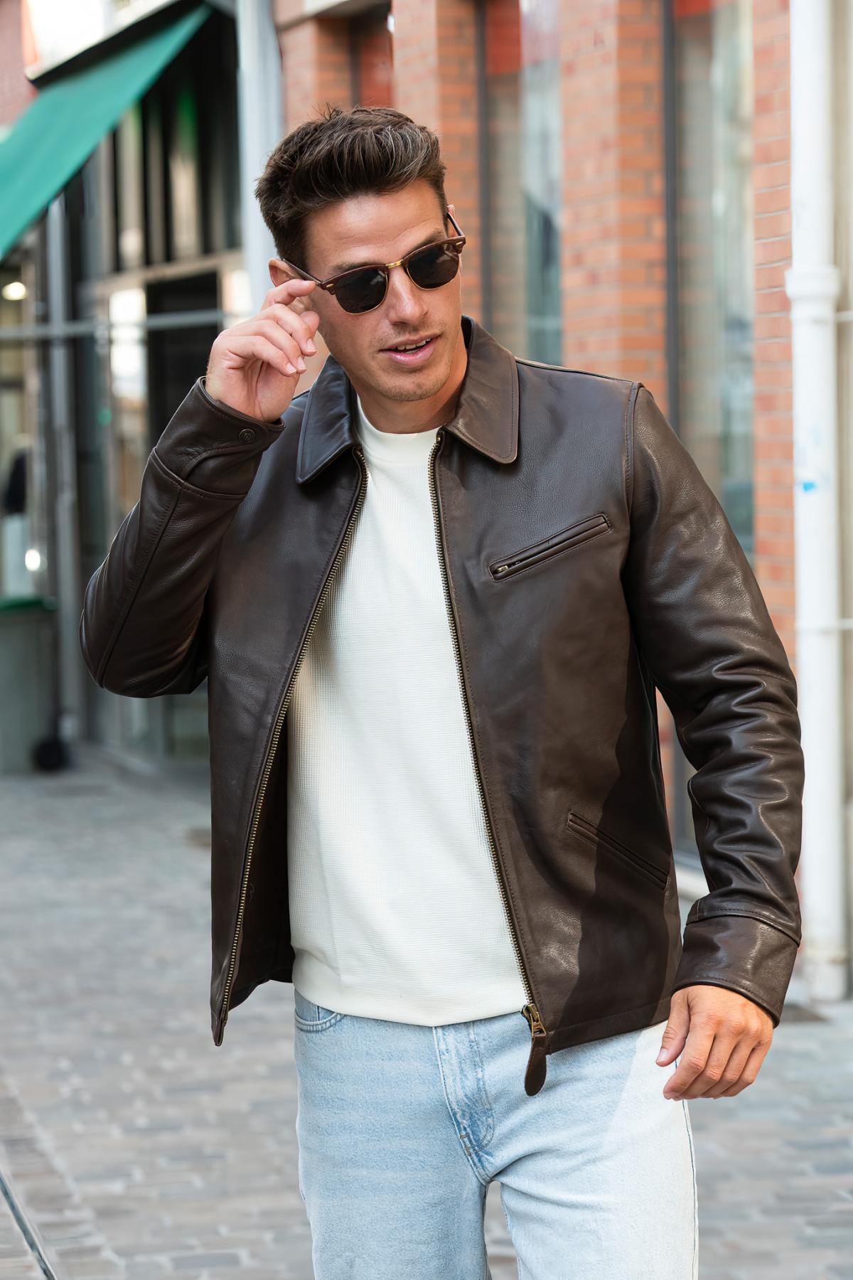 Dark brown casual thick leather jacket - Image n°1