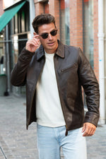 Dark brown casual thick leather jacket - Image n°1