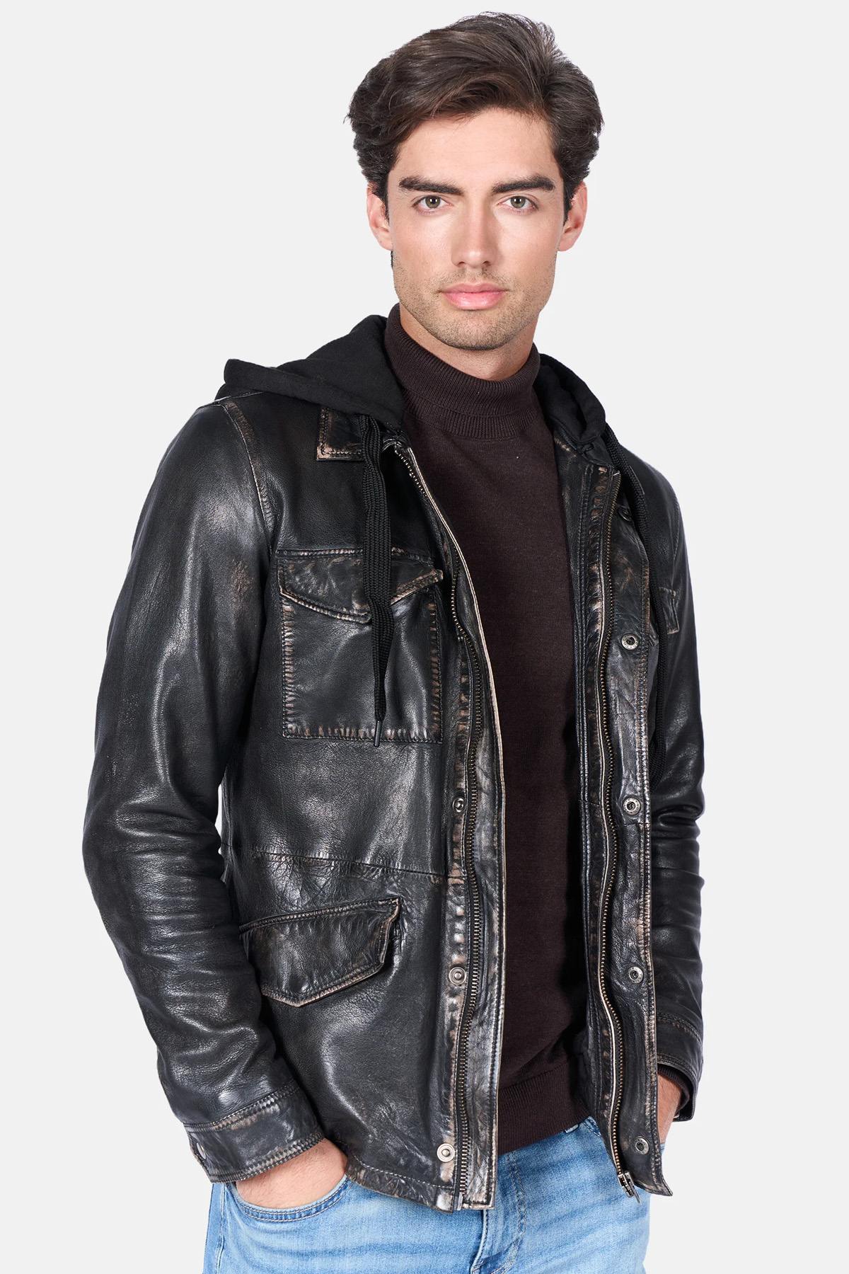 Sheep leather jacket in used black: detachable hood, asymmetrical zip. - Image n°1