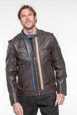 A dark brown sheepskin jacket, soft and light, echoing Steve McQueen. - Image n°1