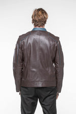 A dark brown sheepskin jacket, soft and light, echoing Steve McQueen. - Image n°4