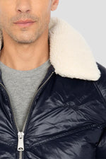 Oversized shiny textile down jacket with faux fur collar - Image n°4