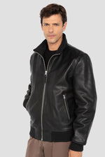 Black jacket with stand-up collar in grained cowhide leather - Image n°1