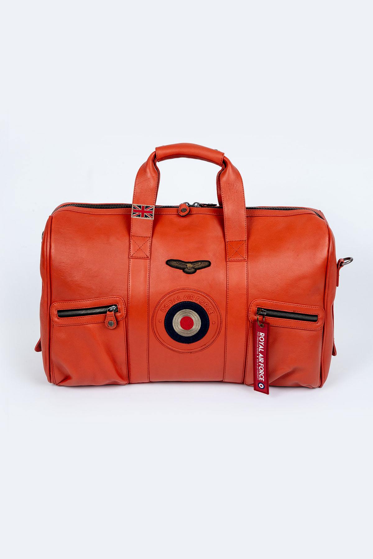 Orange leather travel bag with aviation theme - Image n°1