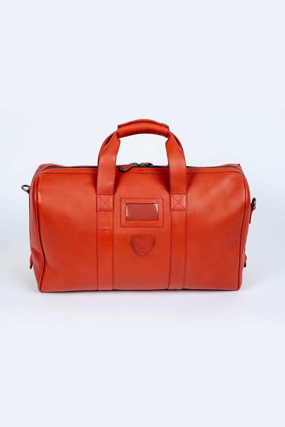Orange leather travel bag with aviation theme - Image n°2