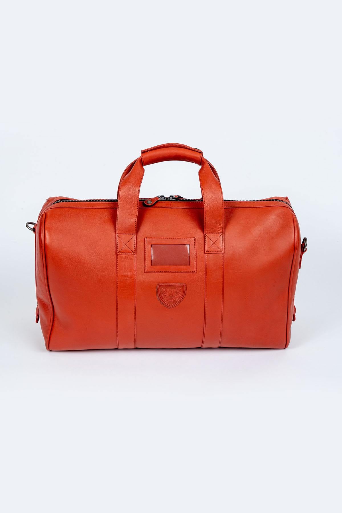 Orange leather travel bag with aviation theme - Image n°2