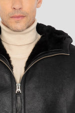Warm reversed sheepskin bomber by Schott in matte black with a hood. - Image n°4