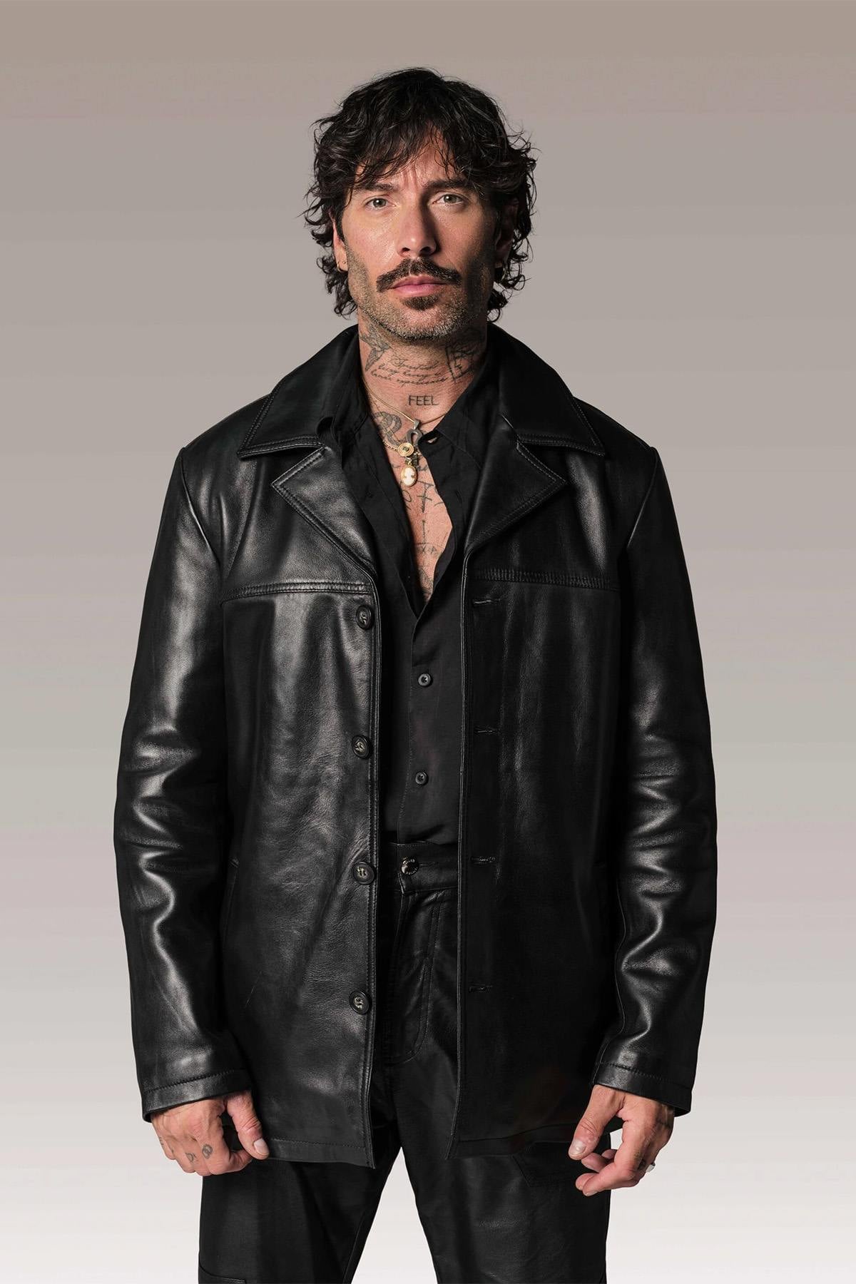 Stylish and sturdy black leather jacket - Image n°1