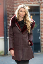 Luxurious wine red shearling jacket, fox fur hood, rashed lamb warmth. - Image n°2