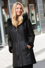 Women's black leather coat with fur hood - Image n°1