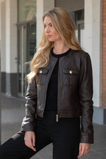 Chocolate shearling jacket, slim fit with a zip front and moto collar. - Image n°1