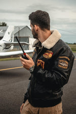 Distressed black leather aviator jacket with patches - Image n°1