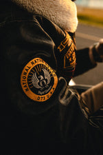 Distressed black leather aviator jacket with patches - Image n°12