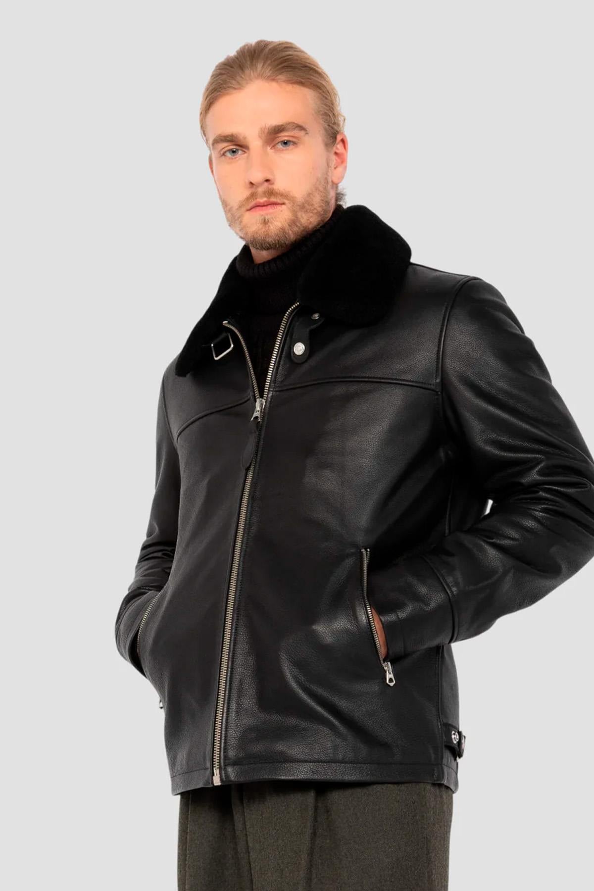 Black leather jacket with fur collar and drawstring strap - Image n°1