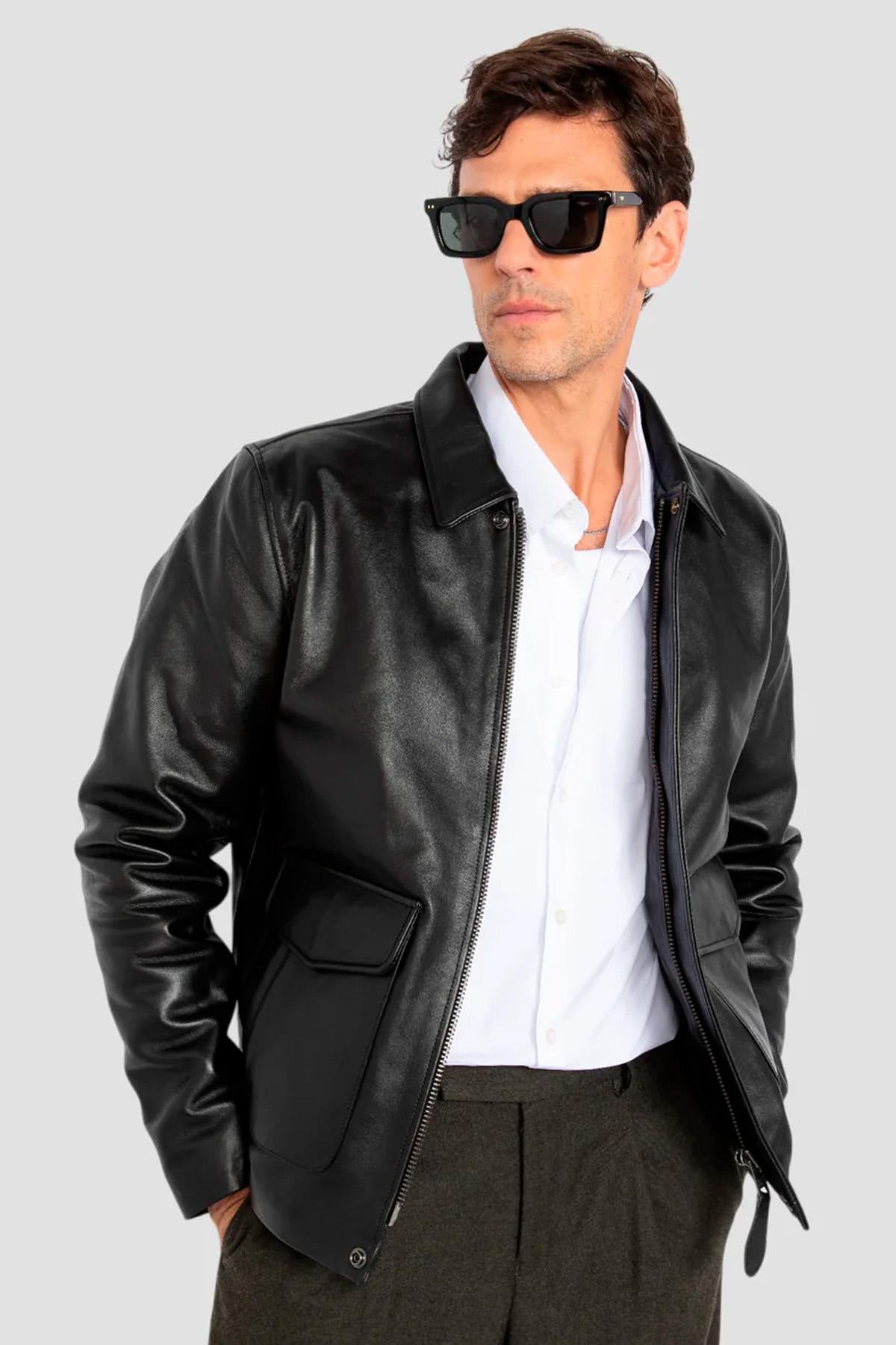 Black leather jacket with shirt collar and flap pockets - Image n°1